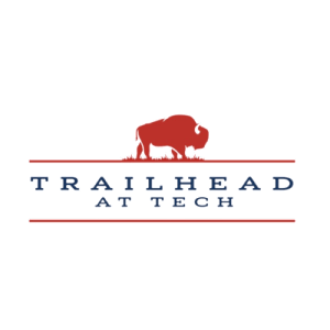 A buffalo silhouette is in front of the words "Trailhead at Tech".