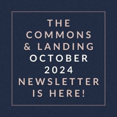 a white box with the words the commons and landing october is here