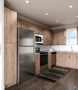 Rendering of the kitchen shows luxury vinyl plank flooring and wood grained cabinets.  There is a white backsplash with a gooseneck faucet.  There is recessed lighting and stainless steel appliances.