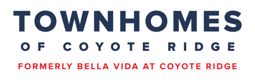 the logo for townhomes of coyote ridge