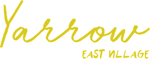 The image displays the word "Yarrow" in a stylized font, with "EAST VILLAGE" written below it.