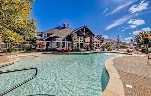 a large pool with a house in the background at Madison Sierra Sun, Washington, 98374