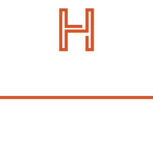 A black and white image of a logo for Haven at the Hills Apartment Homes.