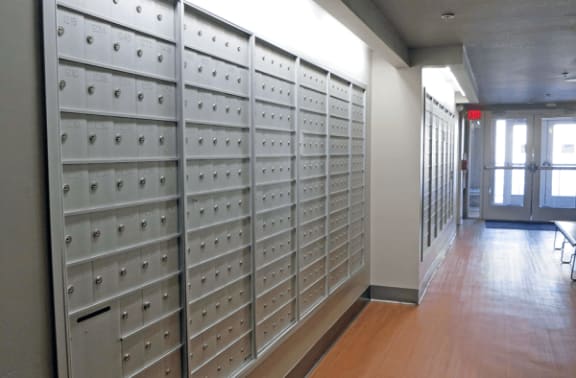 the mail lockers in the hallway of the building