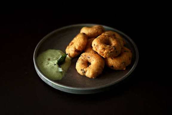 Indian baked treat with dipping sauce