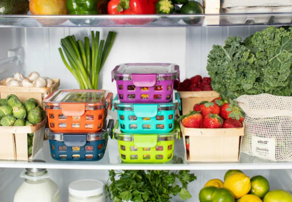 a refrigerator filled with different fruit and vegetables