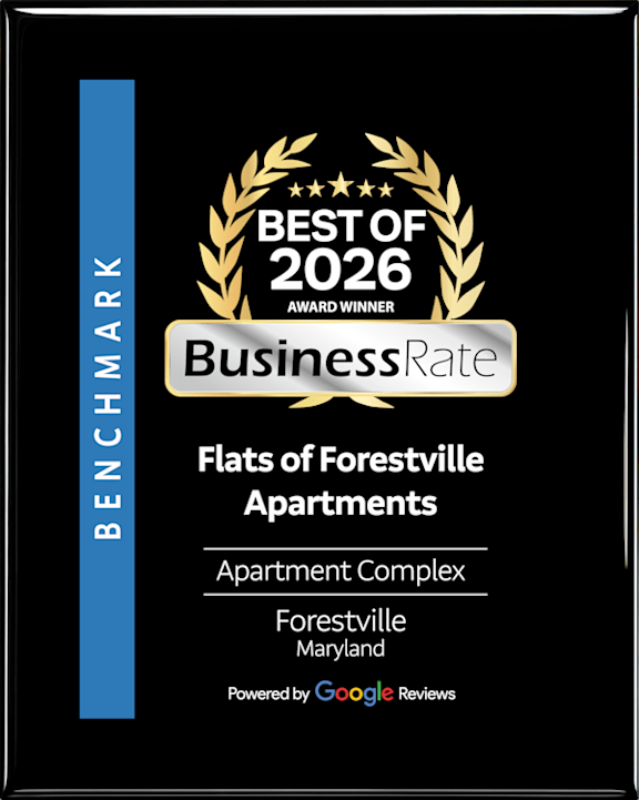 A black and gold award for Flats of Forestville Apartments.