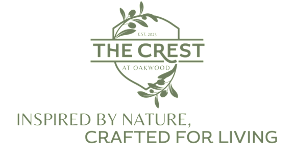 The Crest at Oakwood logo with the tagline "Inspired by nature, crafted for living".