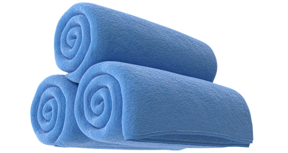 Two rolled up blue towels on a black background.