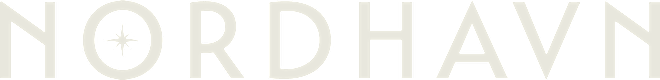 A black and white image with the word "NORDHAVN" and a star symbol.