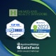 a graphic showing two awards winners for heartland realty investors and saintfactors