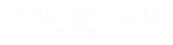 A sign that says Gwinnett Square Apartments.