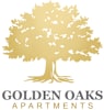 the golden oaks apartments logo of an oak tree