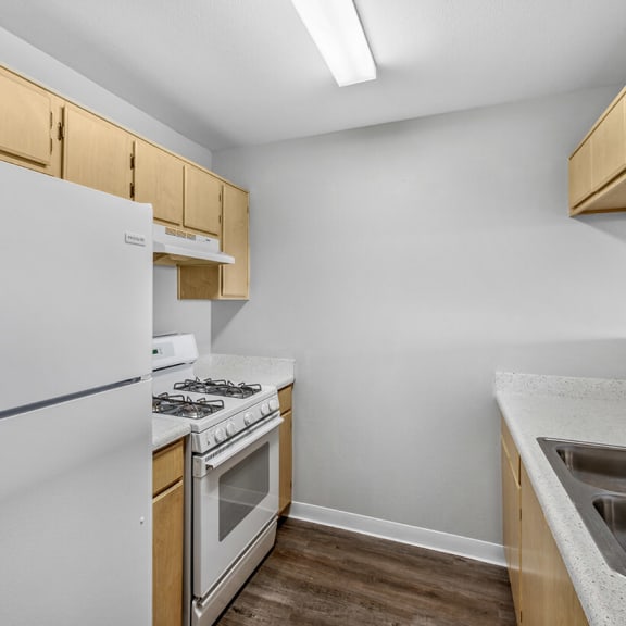vacant apartment kitchen at harvard yard apartments in los angeles ca