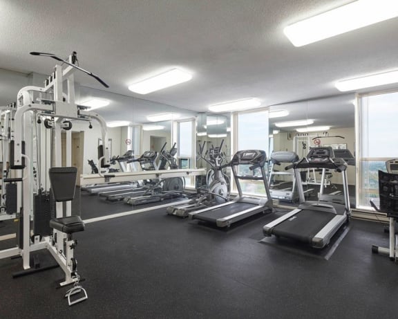 On-site fitness centre with weights and cardio machines
