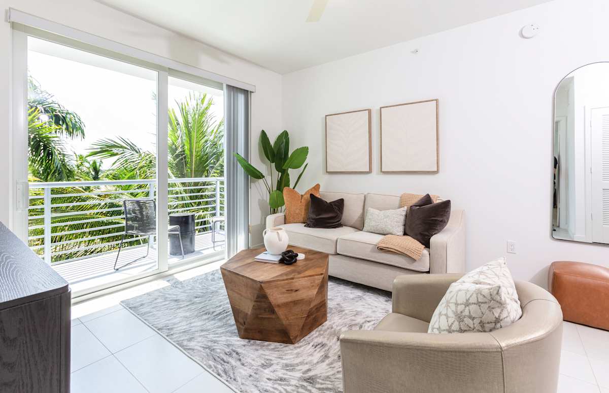 Furnished living room at 10X Boca Raton