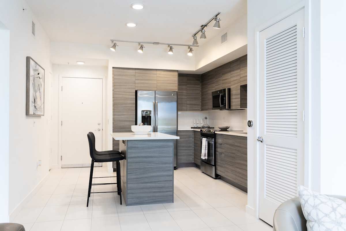 Kitchen and entry view at 10X Boca Raton