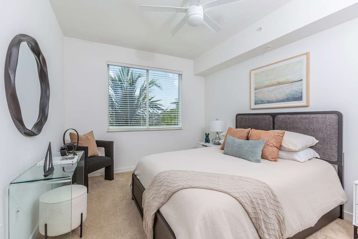 Furnished bedroom at 10X Boca Raton