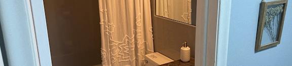 Spacious bathroom in East Lansing Apartments near Michigan State University | Abbott Pointe