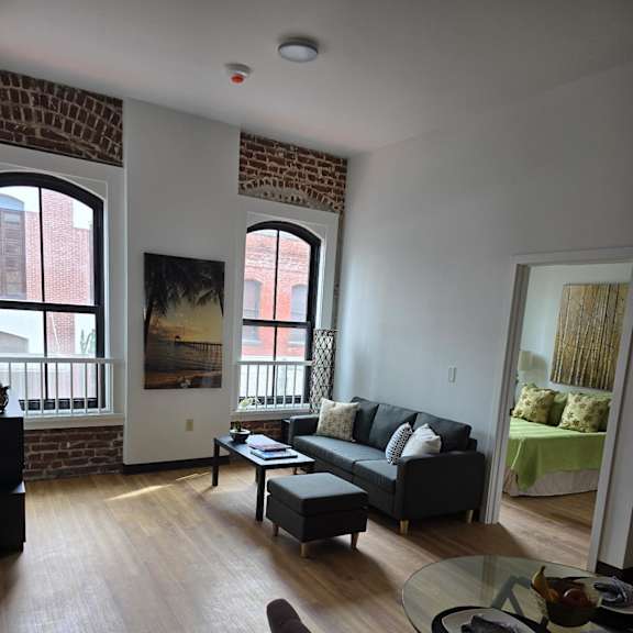 a view of the living room from above from the loft