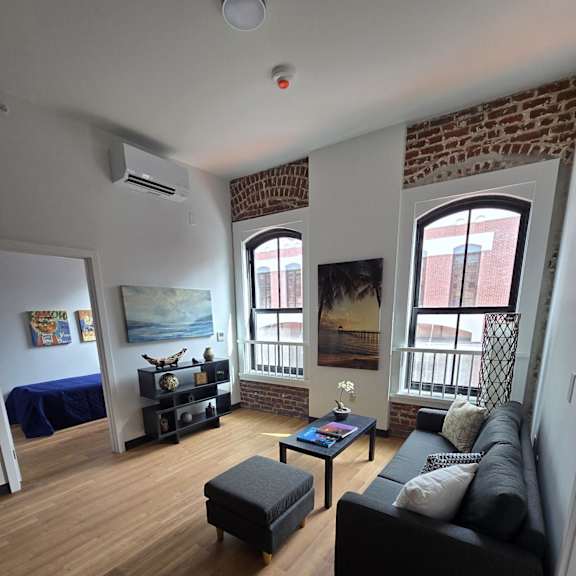 an overhead view of the living room of a tiny house