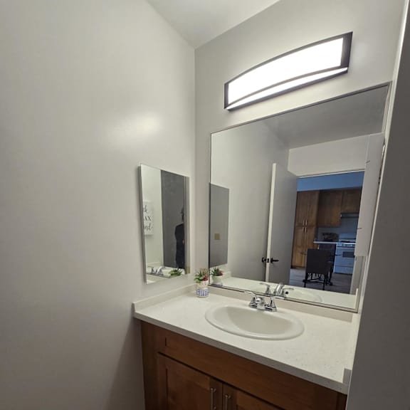 a bathroom with a sink and a washing machine