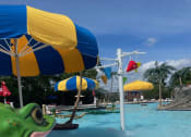 Thumbnail 14 of 15 - a view of a pool from a water slide at a water park