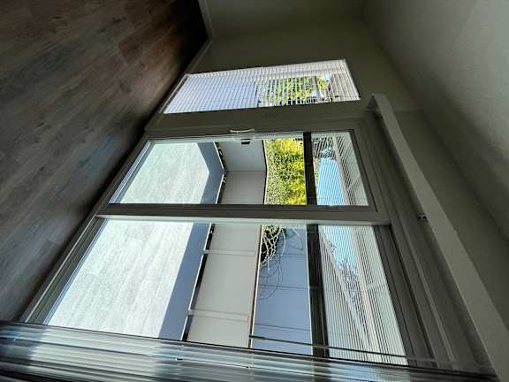 A modern interior with a skylight allowing natural light to enter.