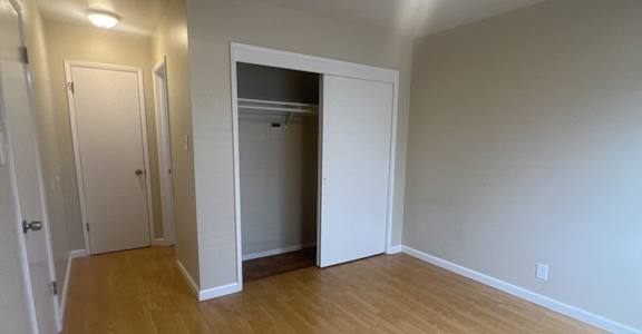 a view of the loft from the bottom of the stairs