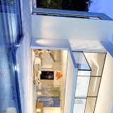 a large white house with a swimming pool