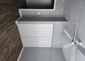 Thumbnail 4 of 21 - A ceiling fan is mounted on the wall above a vent.