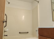Thumbnail 9 of 18 - a kitchen with a sink and a faucet in the corner of a room
