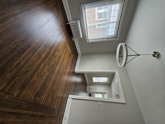 a view from above of a stairwell with a window and a wooden wall at Cincinnati Premier Living*, Ohio, 45213