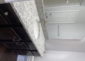 Thumbnail 43 of 44 - bathroom with granite countertop