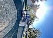 Thumbnail 44 of 44 - a park with multiple slides at The Bryant Apartments at Yorba Linda, California