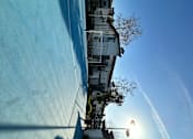 Thumbnail 25 of 44 - a view of the side of a building and sports court