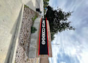 Thumbnail 34 of 34 - a sign on the side of a building at City View Apartments at Warner Center, Woodland Hills, CA 91367
