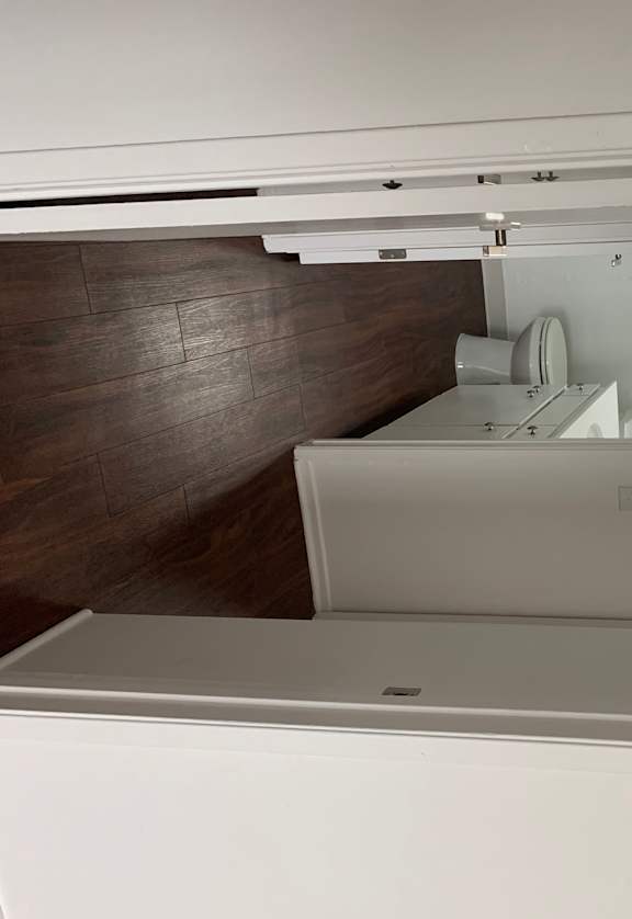 Hallway with wood floors