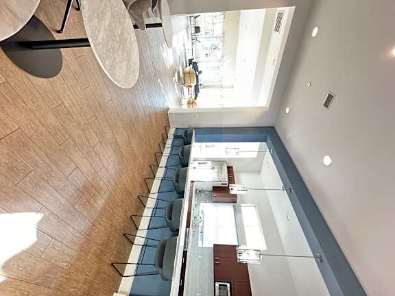 a view of an eating area in the clubhouse at The Bryant Apartments at Yorba Linda, California, 92887
