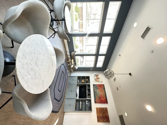 a view of the dining room from the loft at The Bryant Apartments at Yorba Linda, California