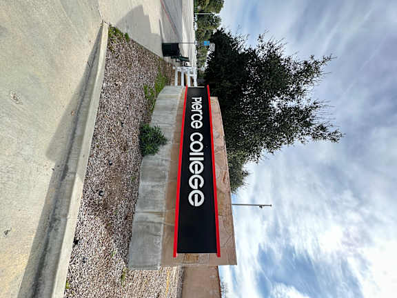 a sign on the side of a building at City View Apartments at Warner Center, Woodland Hills, CA 91367