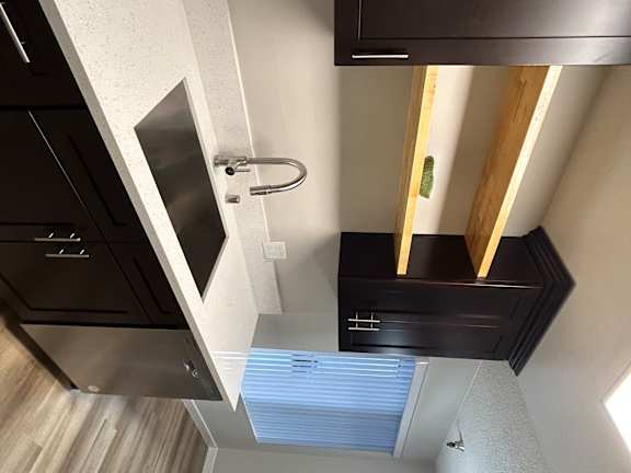 a view from above of a kitchen with a sink and a window