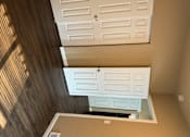 Thumbnail 37 of 48 - A white door is on the bottom and a white door with a window above it.