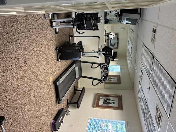 A room with a camera and monitor set up.