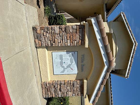 A building with a sign that says Villa Ruste.