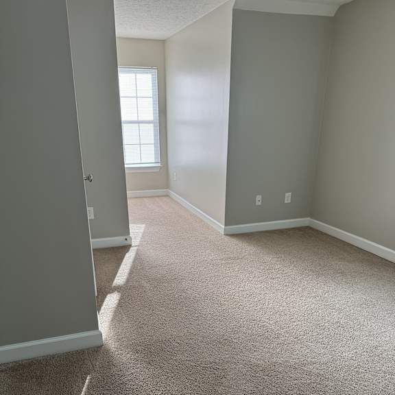 A wall with a window in the middle of it.