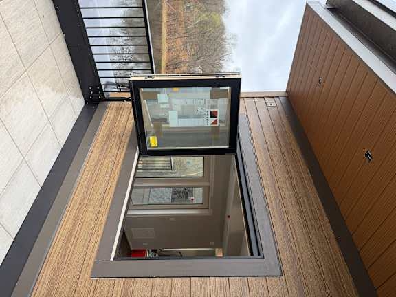 Rooftop accordion window