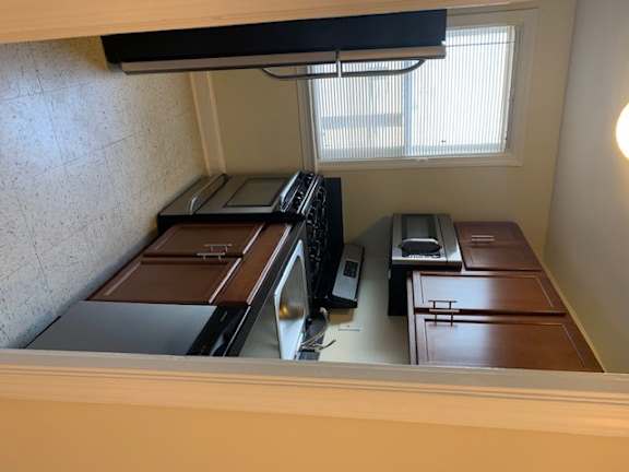 an overhead view of a kitchen with a window