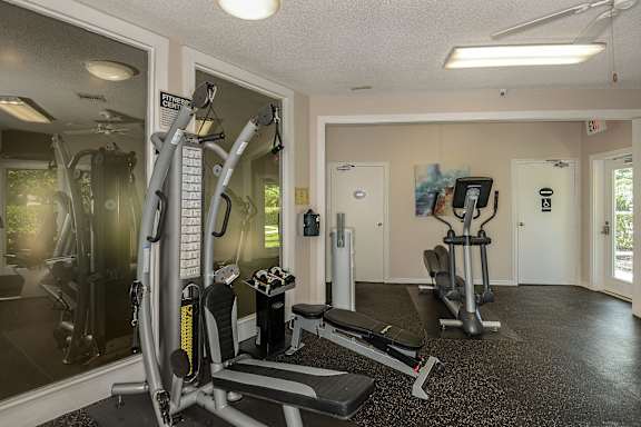 Community gym with weight machines.