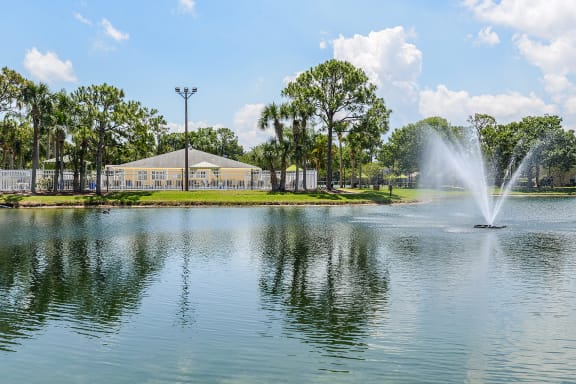 Lake with fountain and the club house in the background.